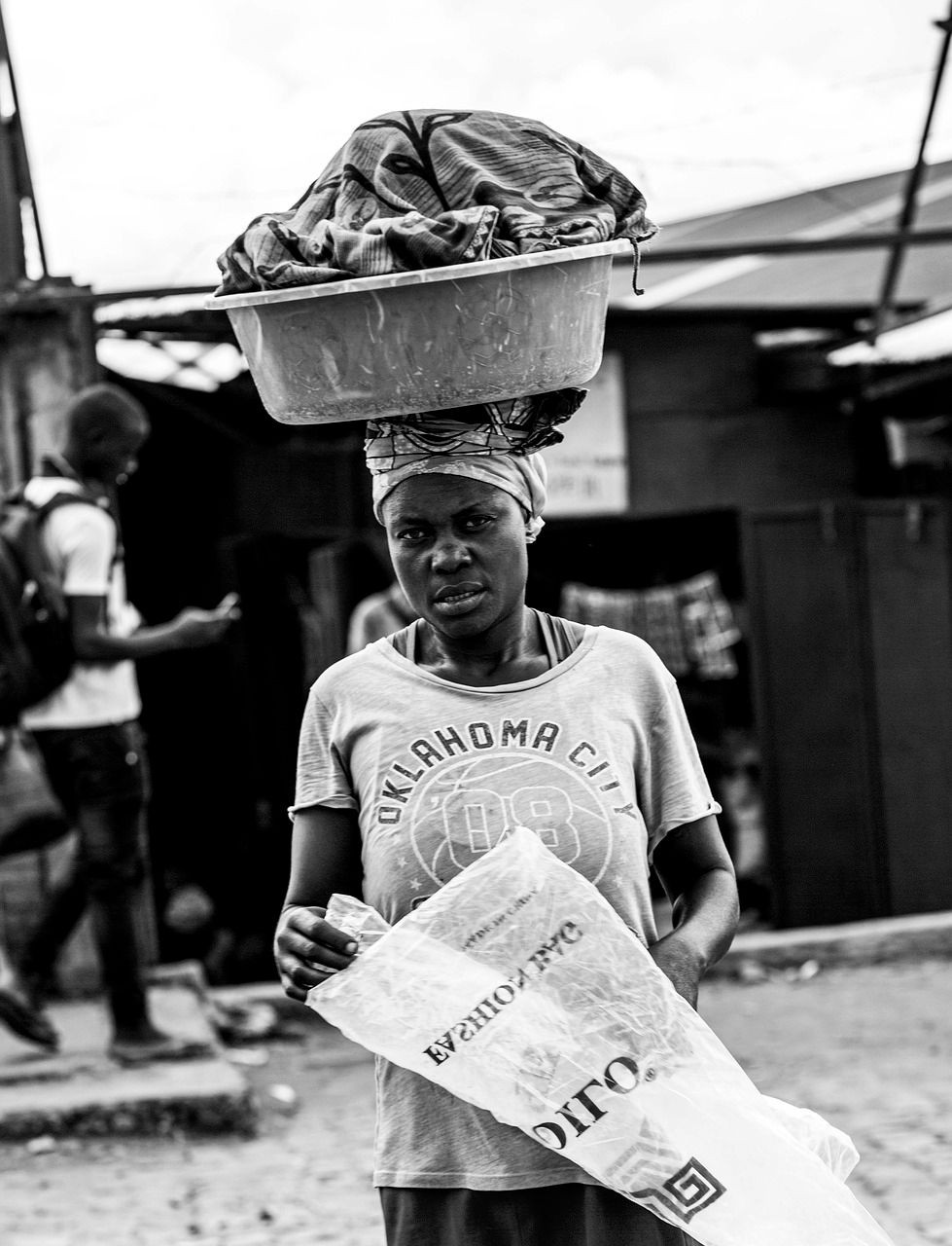 woman with basin on her head Burundi